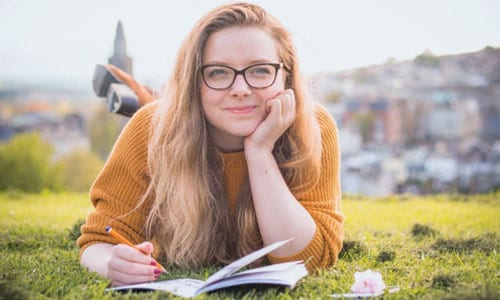 Girl reading outside