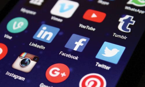 Social media app icons on smartphone